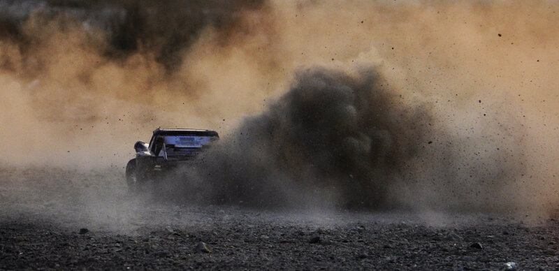 Racing Car Kicking Up Dust