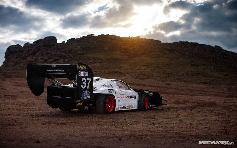 Racing Car on Dirt — White, Dramatic, Sunset, Photograph