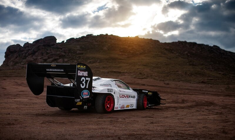 Racing Car on Dirt — White, Dramatic, Sunset