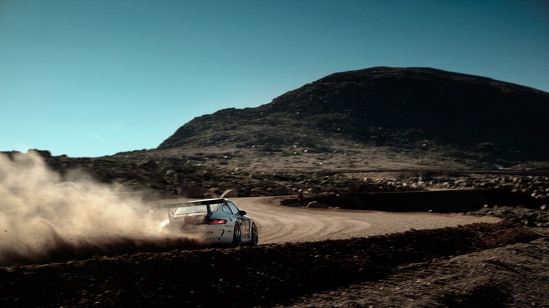 racing car on dusty track