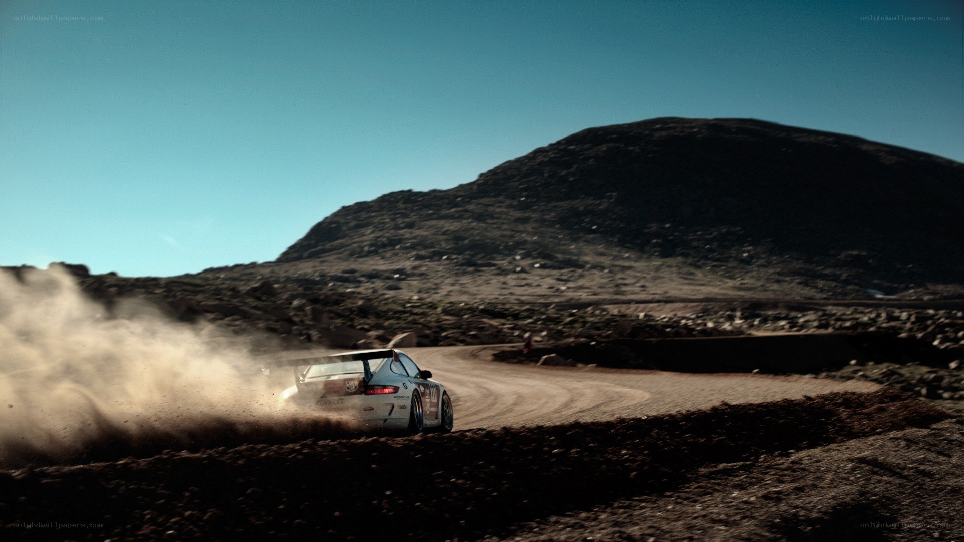 racing car on dusty track