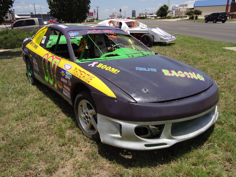 Racing Car on Grass — Purple