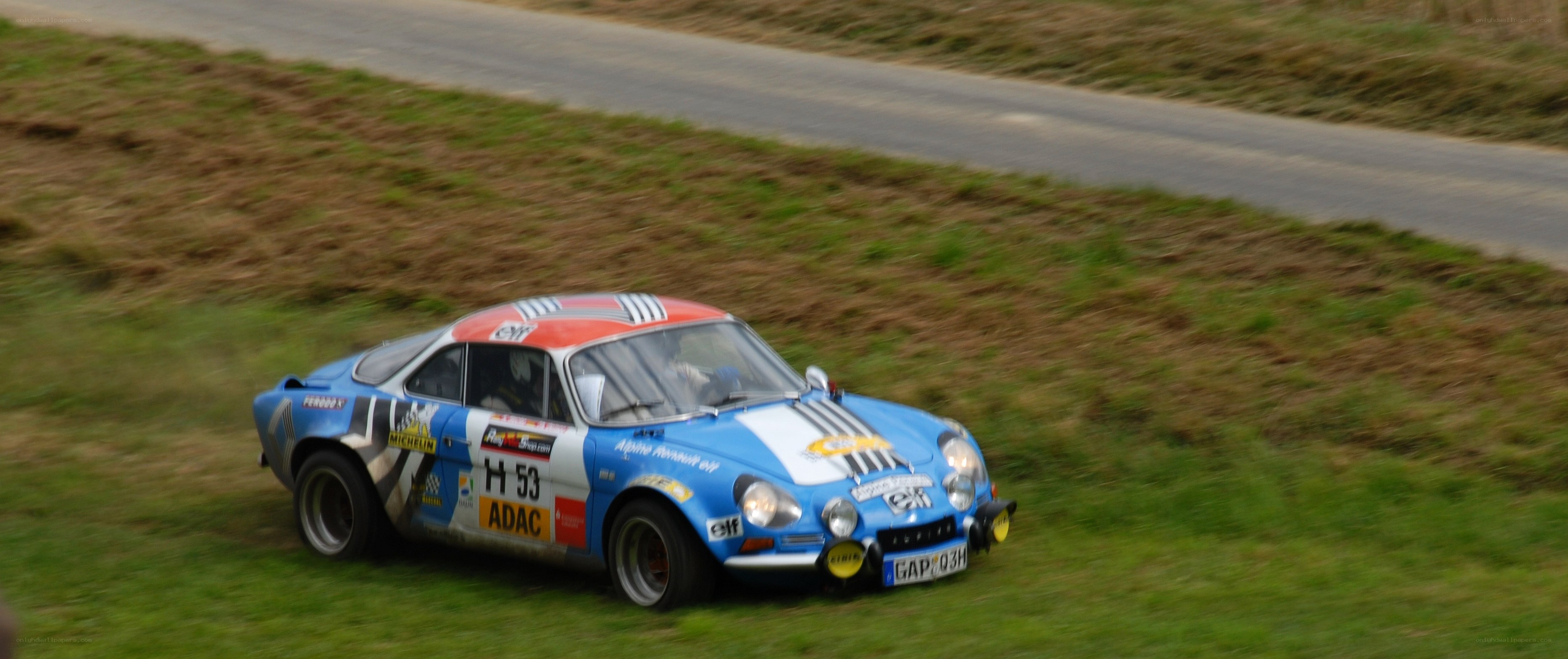 racing car on grassy track