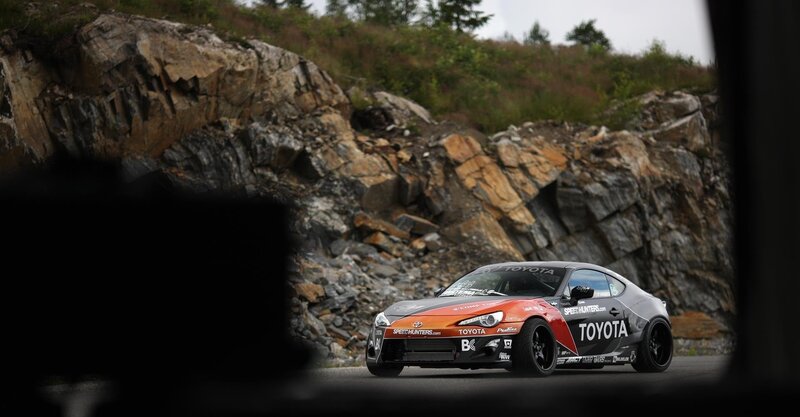 Racing Car on Road — Black, Dynamic, Photograph