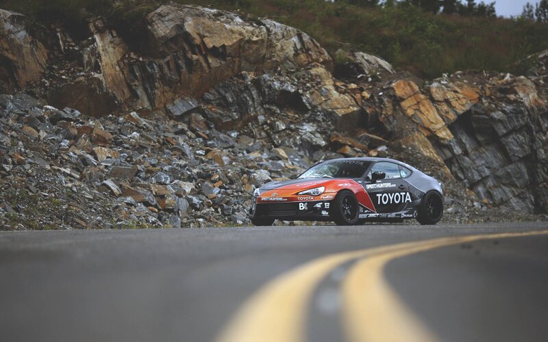 Racing Car on Road — Black
