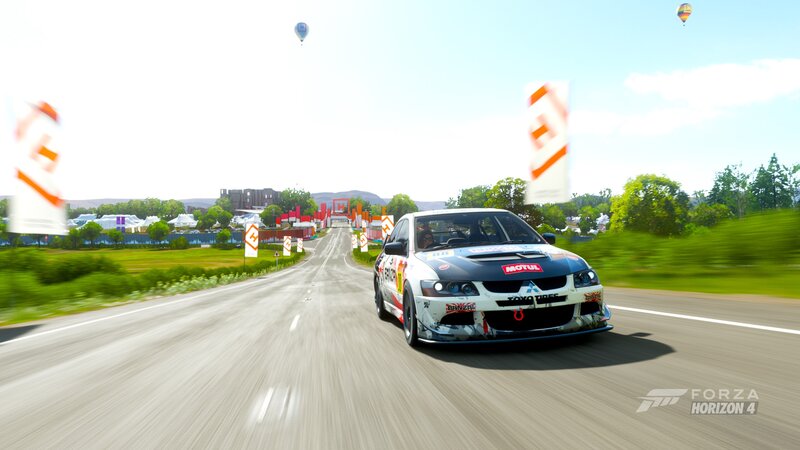 Racing Car on Road — White, Dynamic, Afternoon