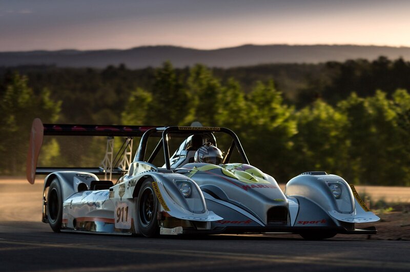 racing car on track at dusk