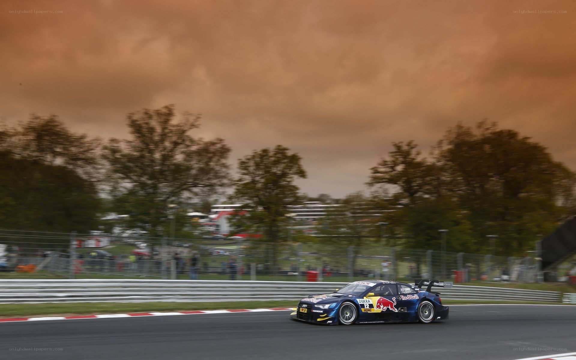 racing car on track at dusk