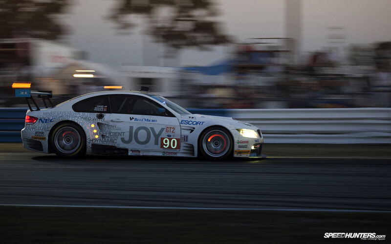 racing car on track at dusk