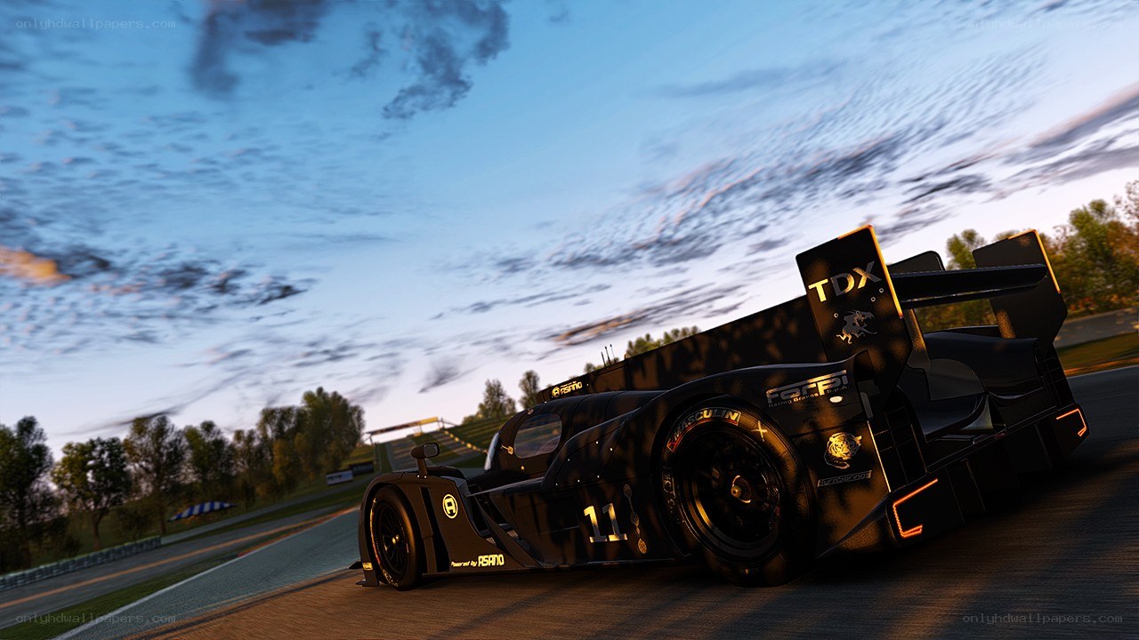 racing car on track at dusk