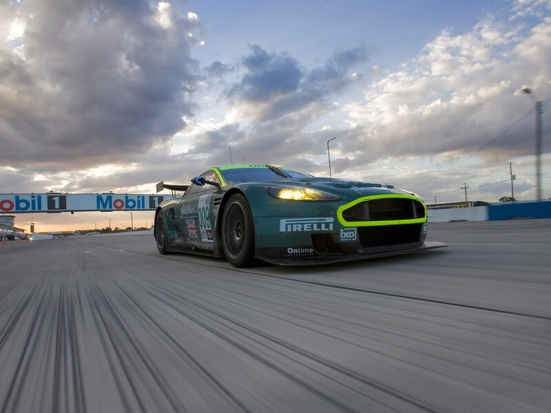 racing car on track at sunset