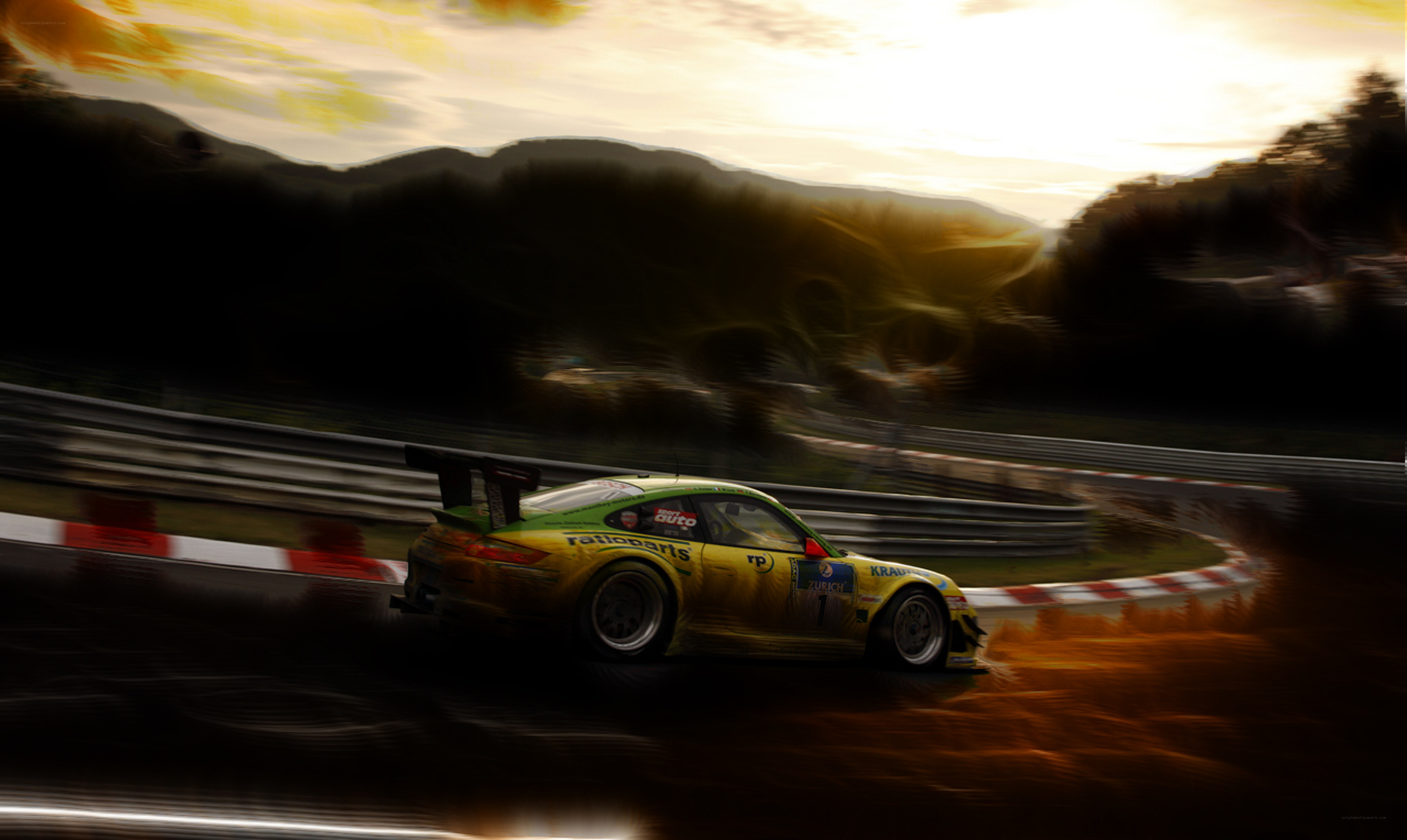 racing car on track at sunset