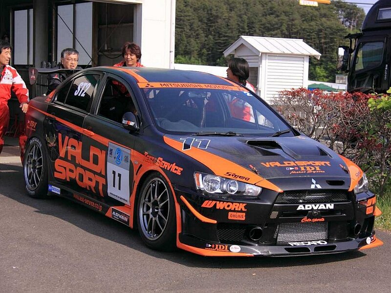 Racing Car on Track — Black, Active, Afternoon