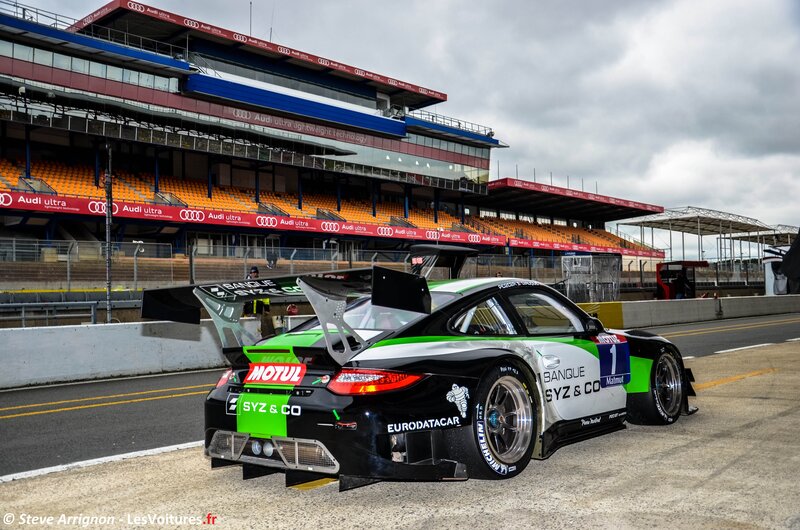 Racing Car on Track — Black, Dramatic, Afternoon, Photograph, Race Car