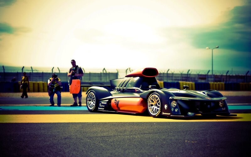 Racing Car on Track — Black, Dramatic, Sunset, Photograph, People