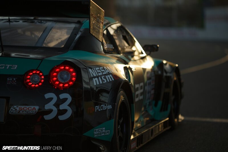 Racing Car on Track — Black, Dramatic, Sunset, Photograph, Race Car