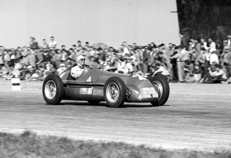 Racing Car on Track — Black, Dynamic, Afternoon, Photograph, Driver, Crowd