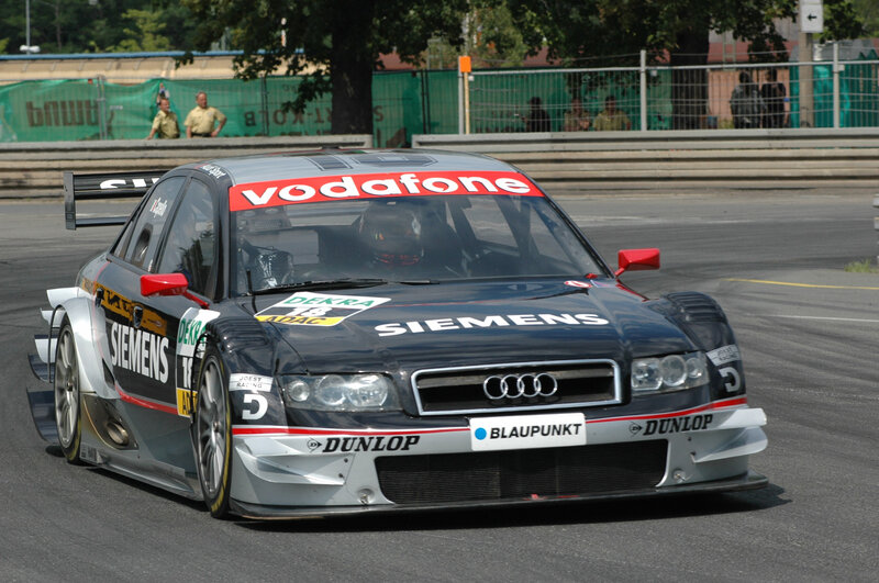 Racing Car on Track — Black, Dynamic, Afternoon, Photograph, Driver, Fence, Trees