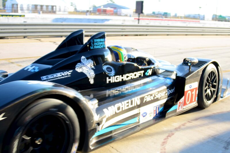 Racing Car on Track — Black, Dynamic, Afternoon, Photograph, Driver, Race Car, Blue
