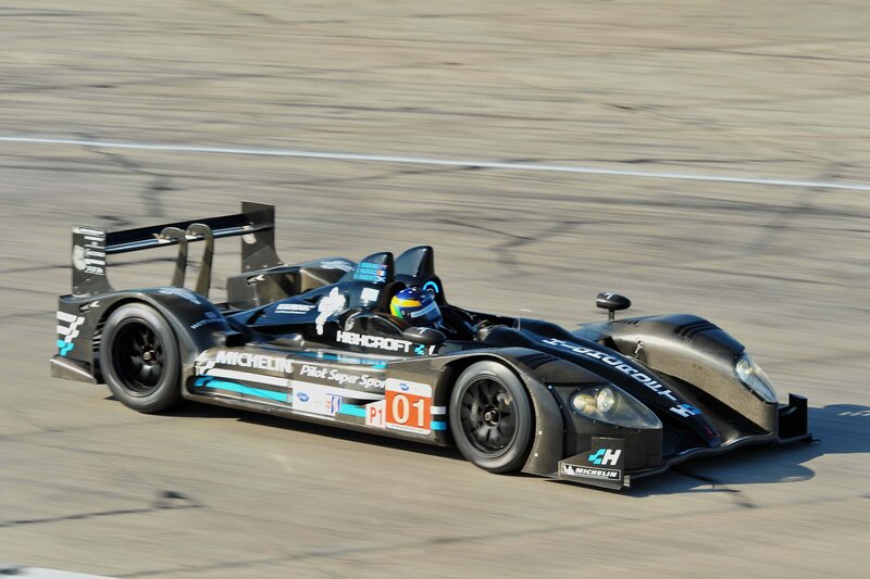Racing Car on Track — Black, Dynamic, Afternoon, Photograph, Driver, Race Car, Blue, White
