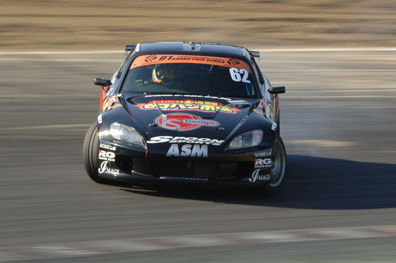 Racing Car on Track — Black, Dynamic, Afternoon, Photograph, Driver, Race Track, White