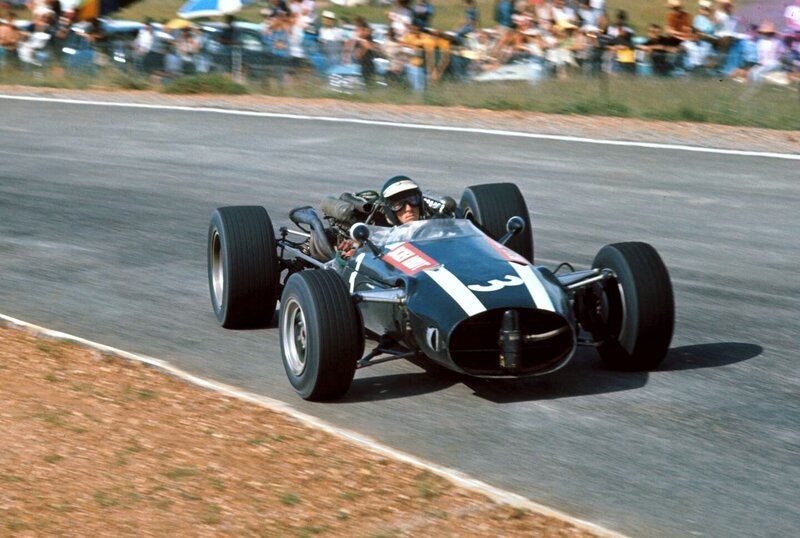 Racing Car on Track — Black, Dynamic, Afternoon, Photograph, Driver, Spectators
