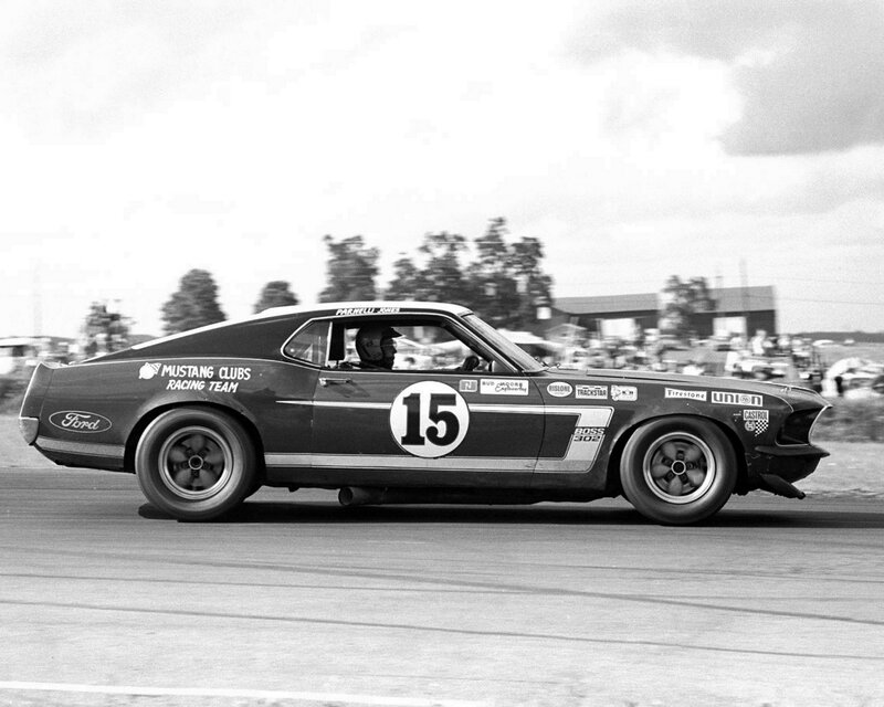 Racing Car on Track — Black, Dynamic, Afternoon, Photograph, Driver