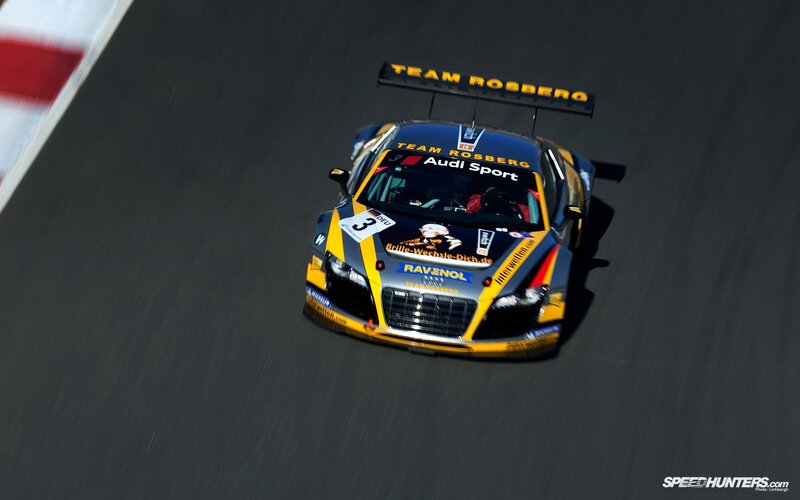 Racing Car on Track — Black, Dynamic, Afternoon, Photograph, Race Car, Driver, Yellow