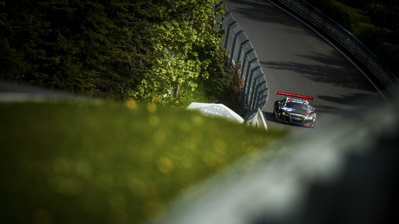 Racing Car on Track — Black, Dynamic, Afternoon, Photograph, Race Car, Guardrail, Trees