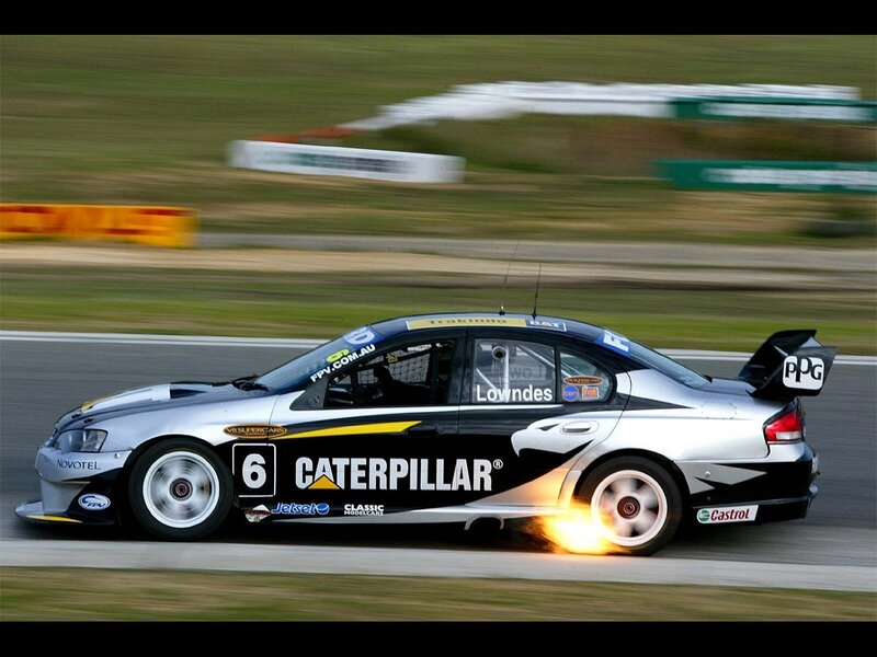 Racing Car on Track — Black, Dynamic, Afternoon