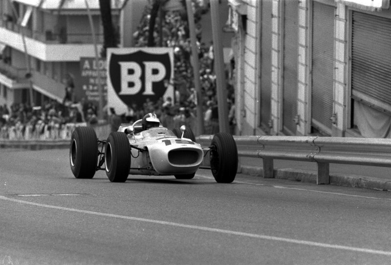 Racing Car on Track — Black, Dynamic, Photograph, Driver, Crowd, Guardrail