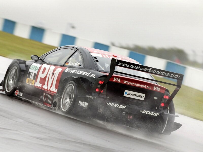 Racing Car on Track — Black, Dynamic, Photograph, Race Car, Tire Spray