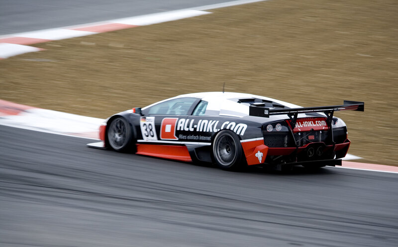 Racing Car on Track — Black, Dynamic, Photograph, Race Car, Tire