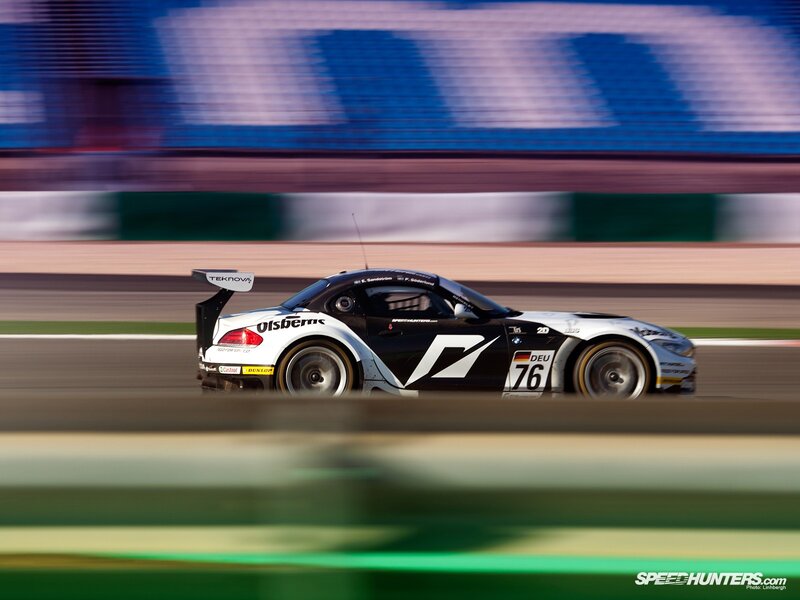 Racing Car on Track — Black, Dynamic, Photograph, Race Car, Tire, White