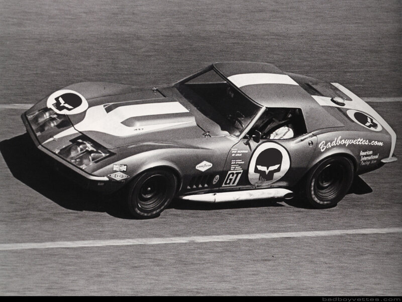 Racing Car on Track — Black, Dynamic, Photograph, Skull Logo