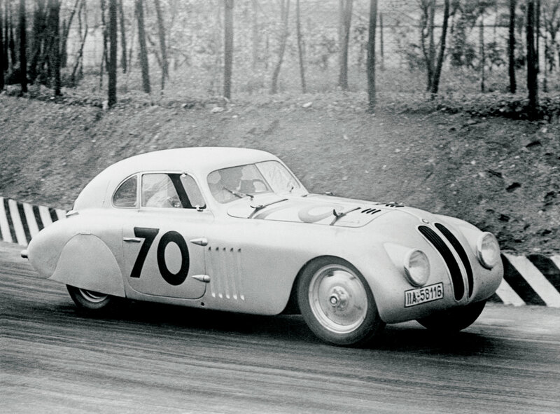 Racing Car on Track — Black, Dynamic, Photograph, Trees