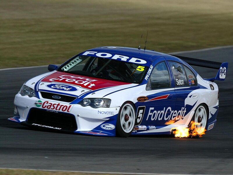 Racing Car on Track — Blue, Dramatic, Afternoon, Photograph