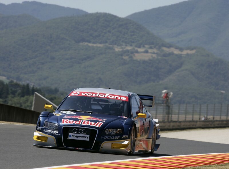 Racing Car on Track — Blue, Dynamic, Afternoon, Photograph, Mountains