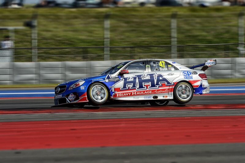 Racing Car on Track — Blue, Dynamic, Afternoon, Photograph, Race Car, Fence