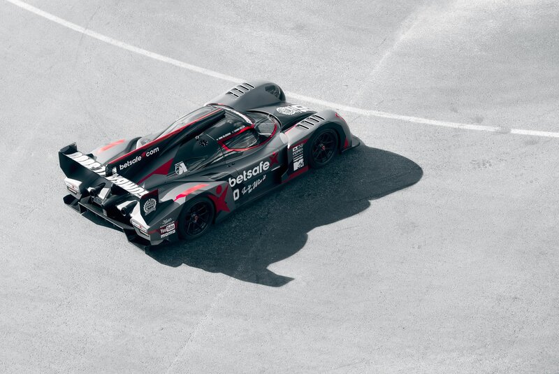 Racing Car on Track — Gray, Dramatic, Afternoon, Photograph, Shadow