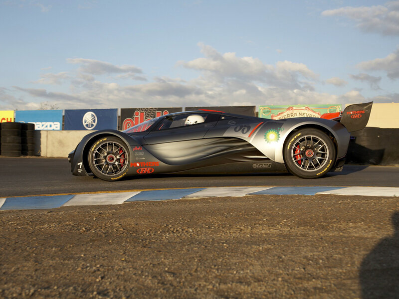 Racing Car on Track — Gray, Dynamic, Afternoon, Photograph, Driver, Tires, Banners