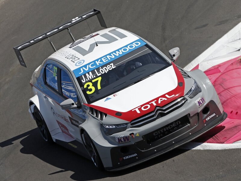 Racing Car on Track — Gray, Dynamic, Afternoon