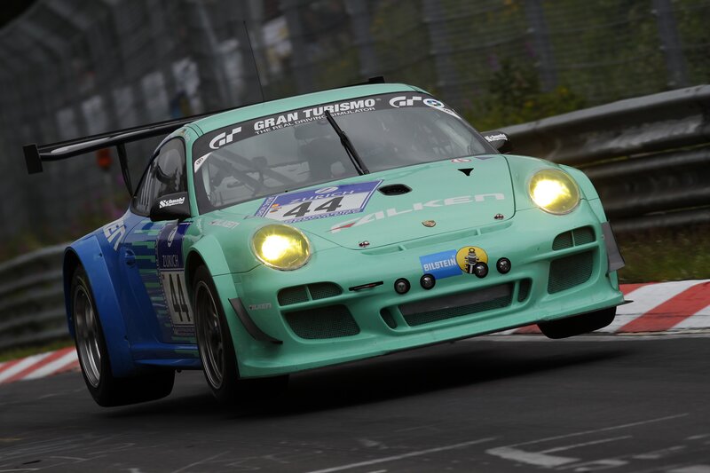 Racing Car on Track — Green, Dynamic, Photograph, Race Car, Fence