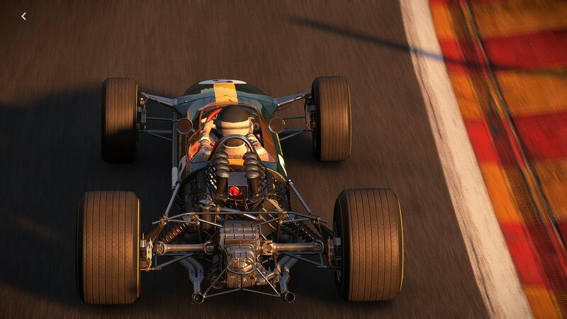 Racing Car on Track — Green, Dynamic, Sunset