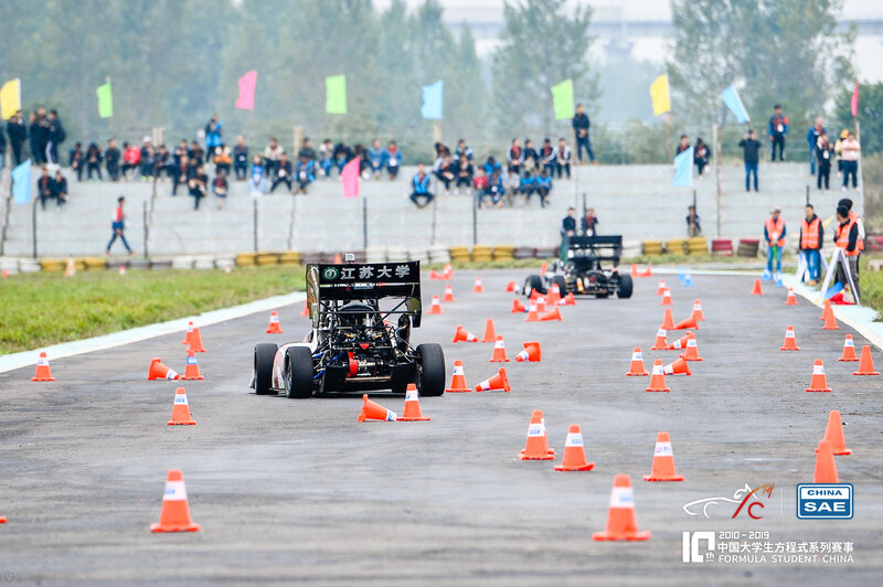 Racing Car on Track — Orange, Competitive