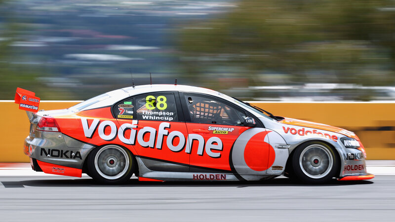 Racing Car on Track — Orange, Dynamic