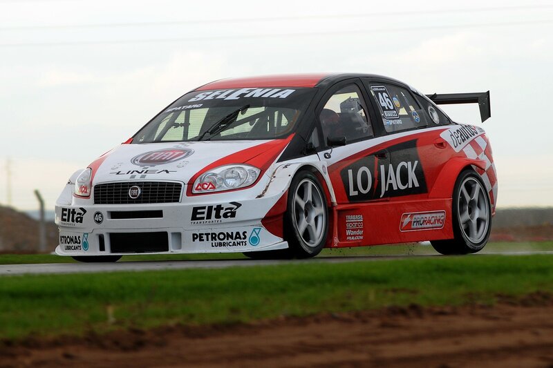 Racing Car on Track — Red, Dynamic, Afternoon, Photograph, Race Car, Grass