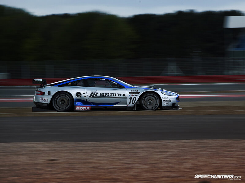 Racing Car on Track — Silver, Dynamic, Afternoon