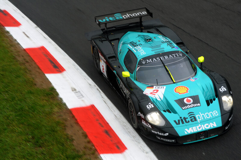Racing Car on Track — Teal, Dynamic, Photograph