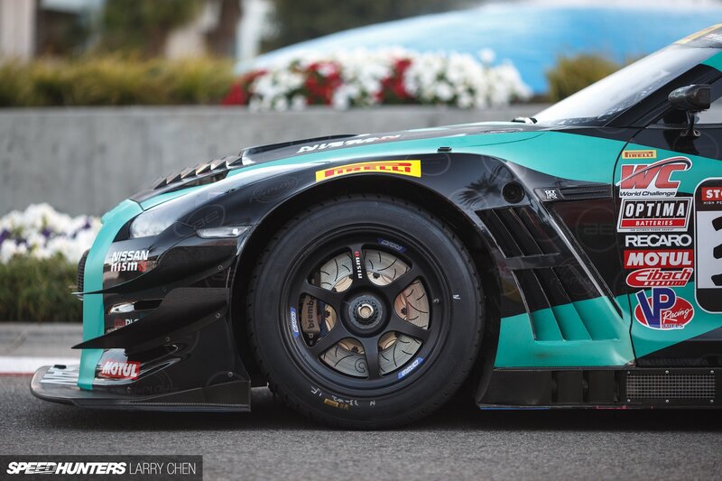 Racing Car on Track — Teal, Focused